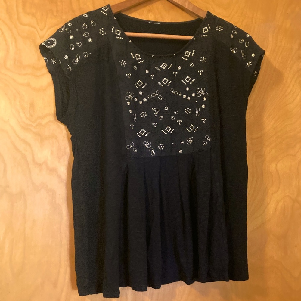 Black top with gold patterns
